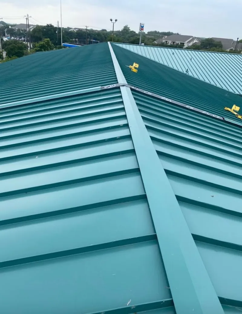 Green commercial metal roof ridge and valley for Metal Roof Repair in Rancho Murieta